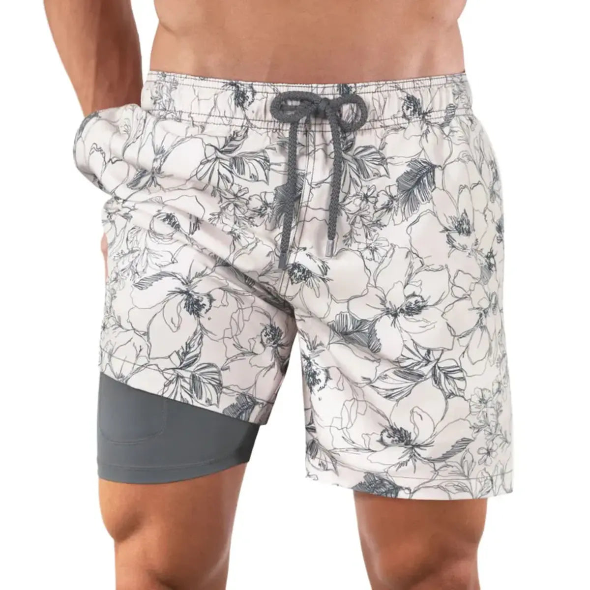 Secret Garden men's hybrid swim short, cream with a charcoal outlined floral print and grey drawstring, front view showing the grey compression liner