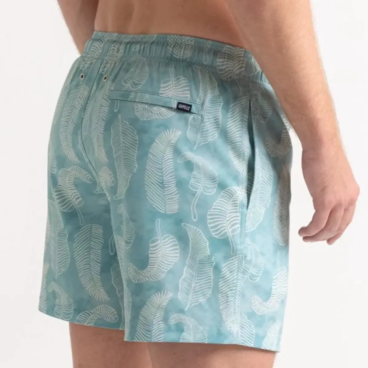 Serenity men's hybrid swim short in pale aqua with a tonal leaf print, back view