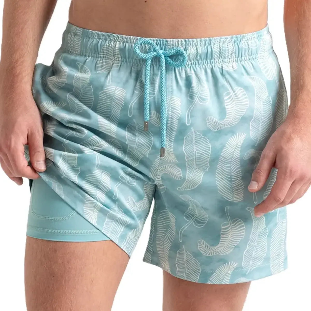 Serenity men's hybrid swim short, pale aqua with a tonal leaf print, front view showing the aqua compression liner