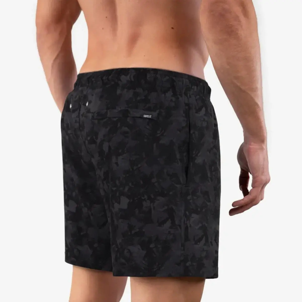 Street Camo men's hybrid swim short in a black and charcoal camouflage print, back view