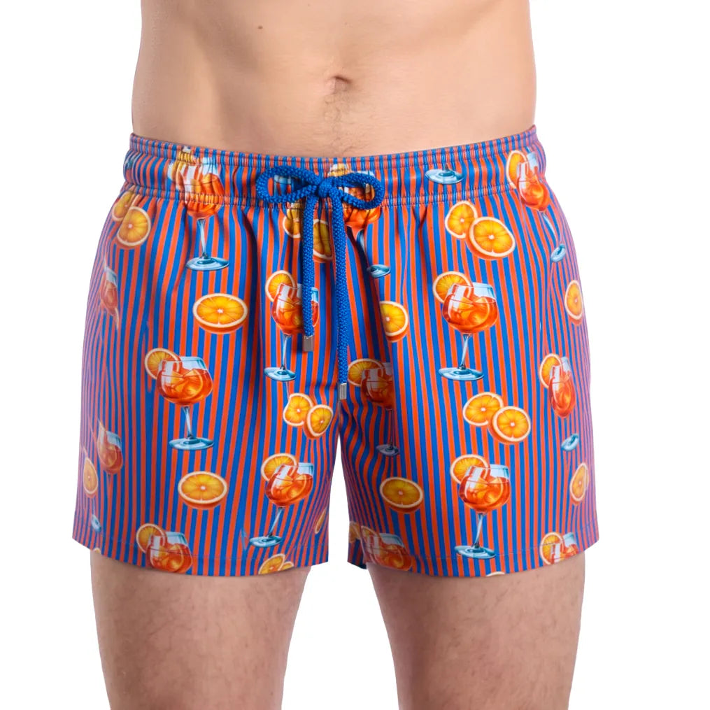 Sunset Spritz, Ocean and Heat men's hybrid swim short in the 3 inch Short, purple and coral stripe with a cocktail print, front view