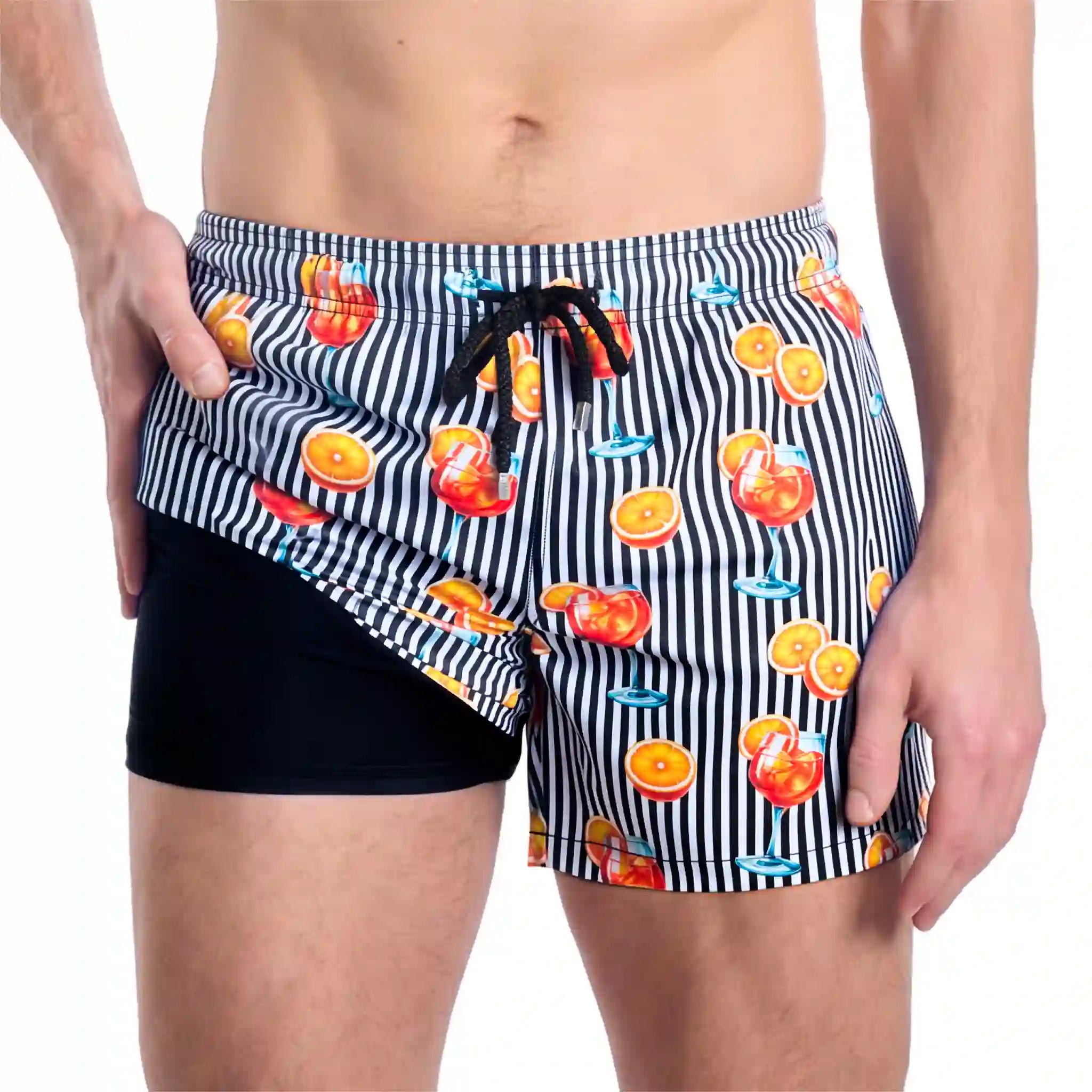 Sunset Spritz, Surf and Storm hybrid swim short in the 3 inch Short, black and white stripe with a spritz cocktail print, showing the built-in compression liner