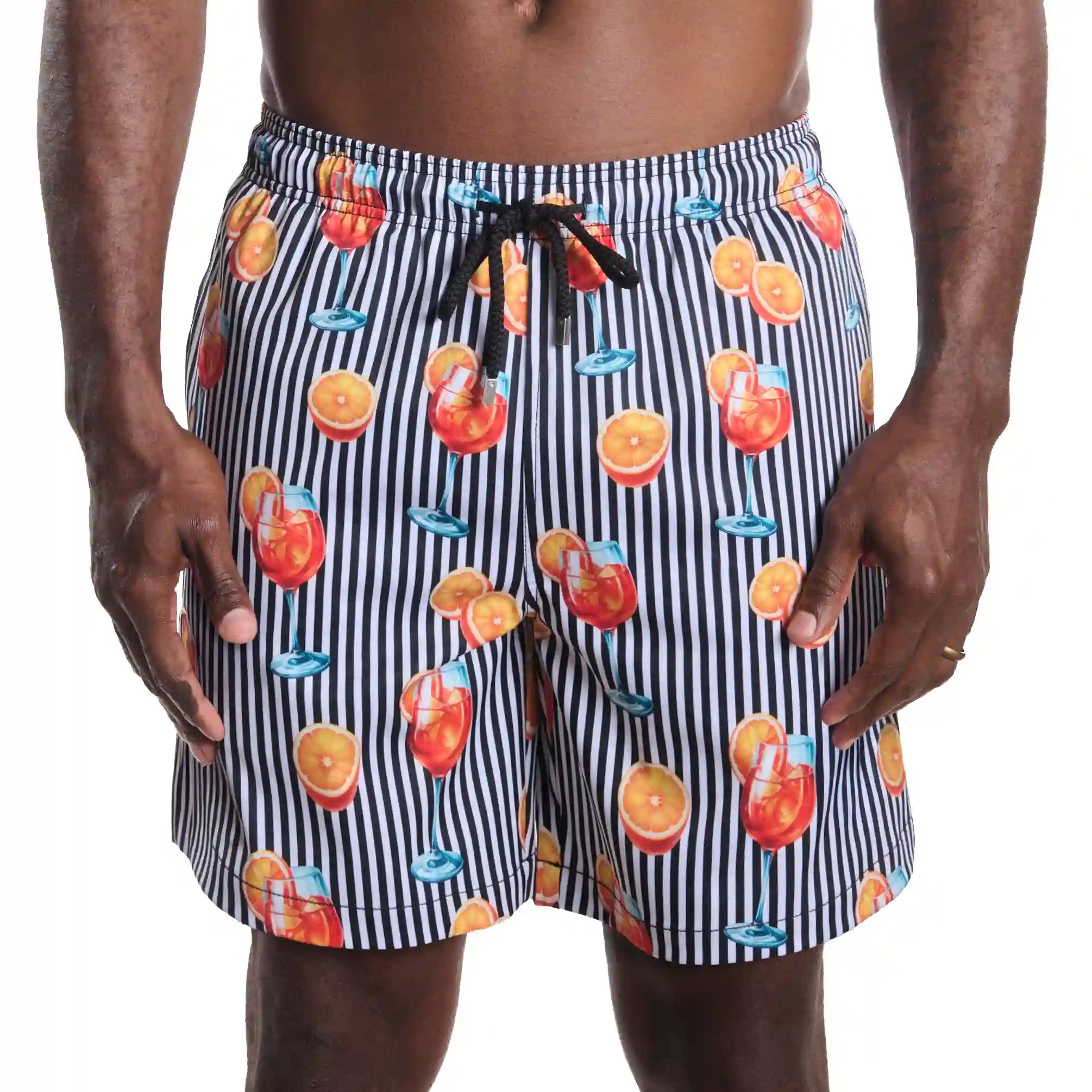 Sunset Spritz, Surf and Storm men's hybrid swim short in the 9 inch Long, black and white stripe with a cocktail print, front view