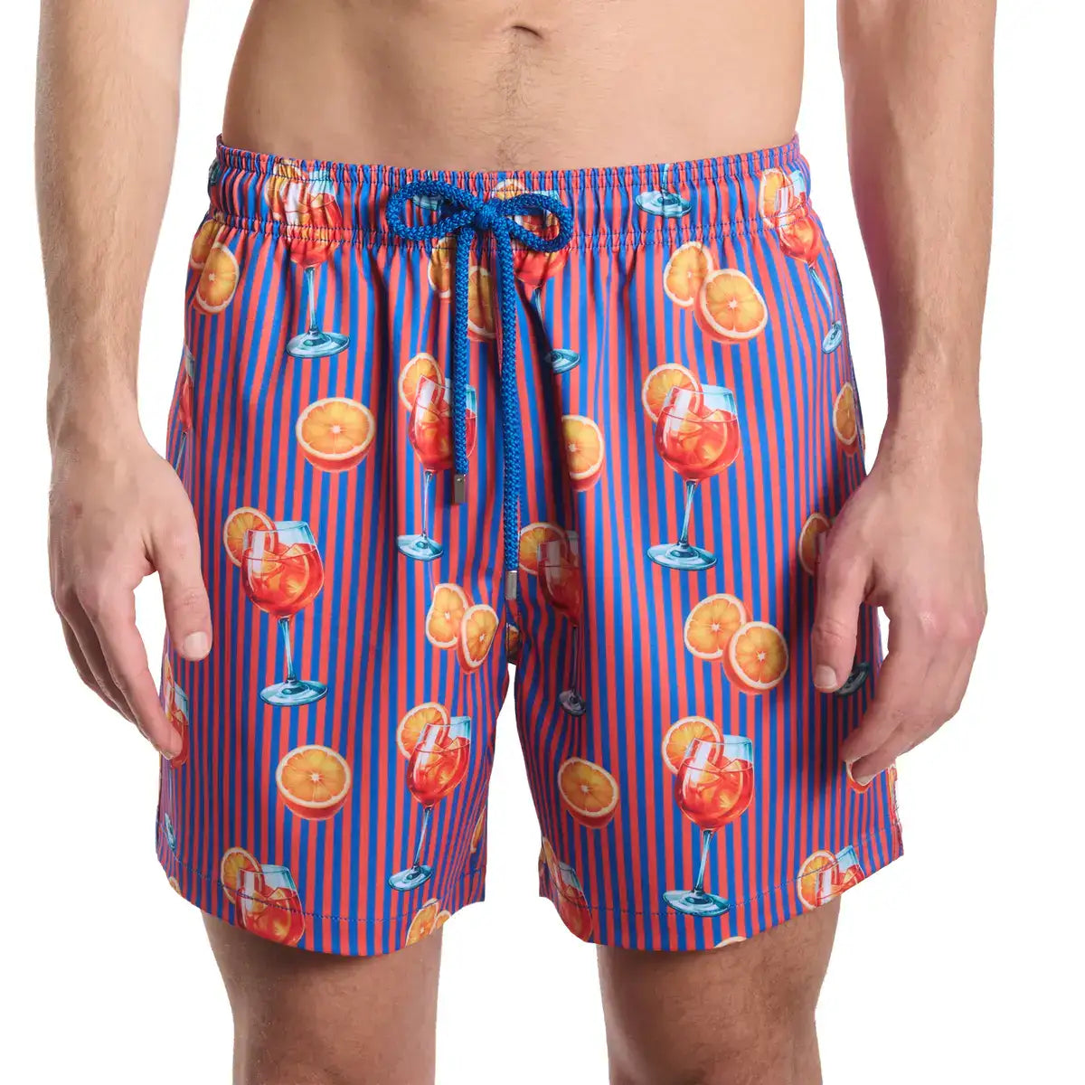 Sunset Spritz, Ocean and Heat men's hybrid swim short in a purple and coral stripe with a spritz cocktail print, front view, second angle