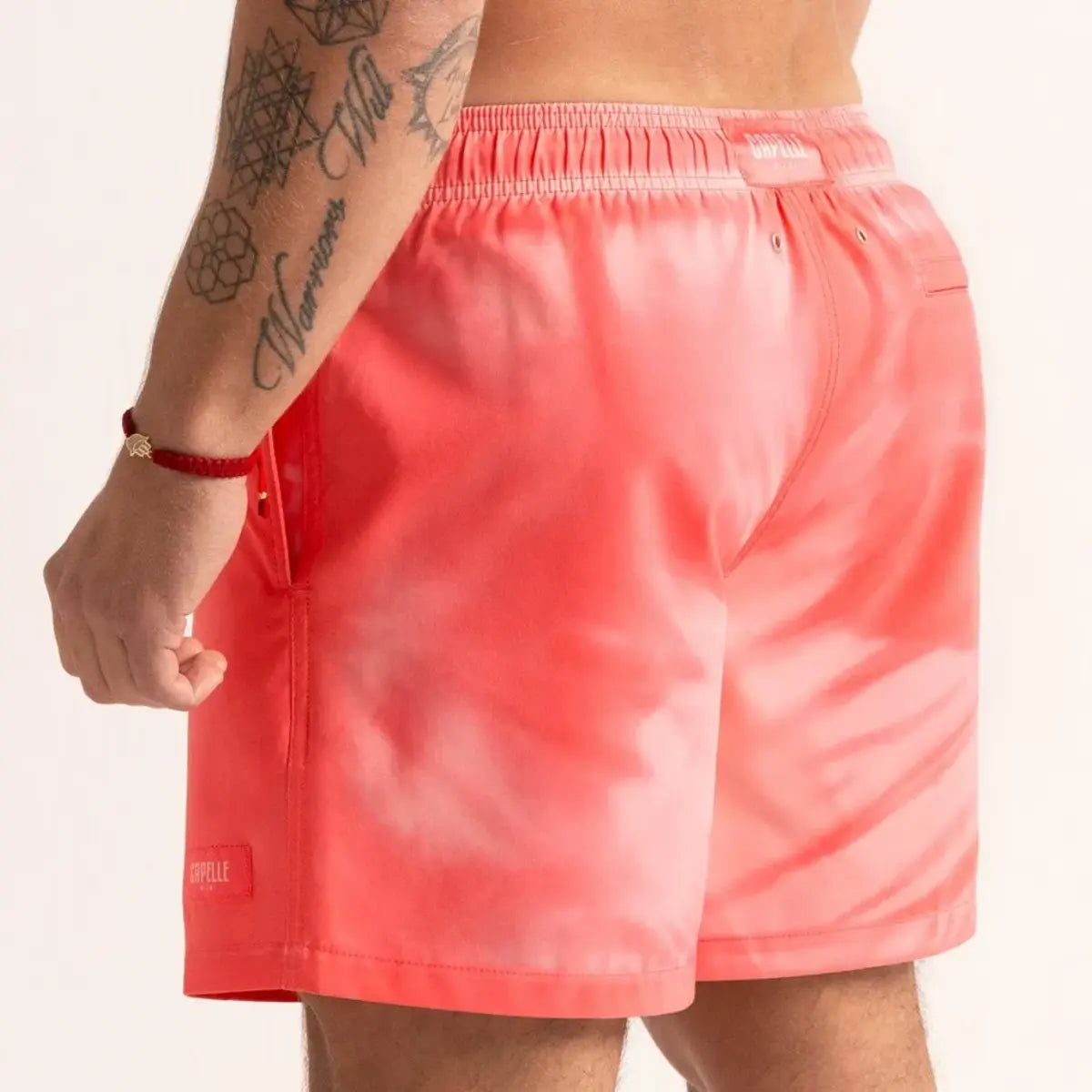 Switch Red/Rosé men's color changing hybrid swim short in red, back view
