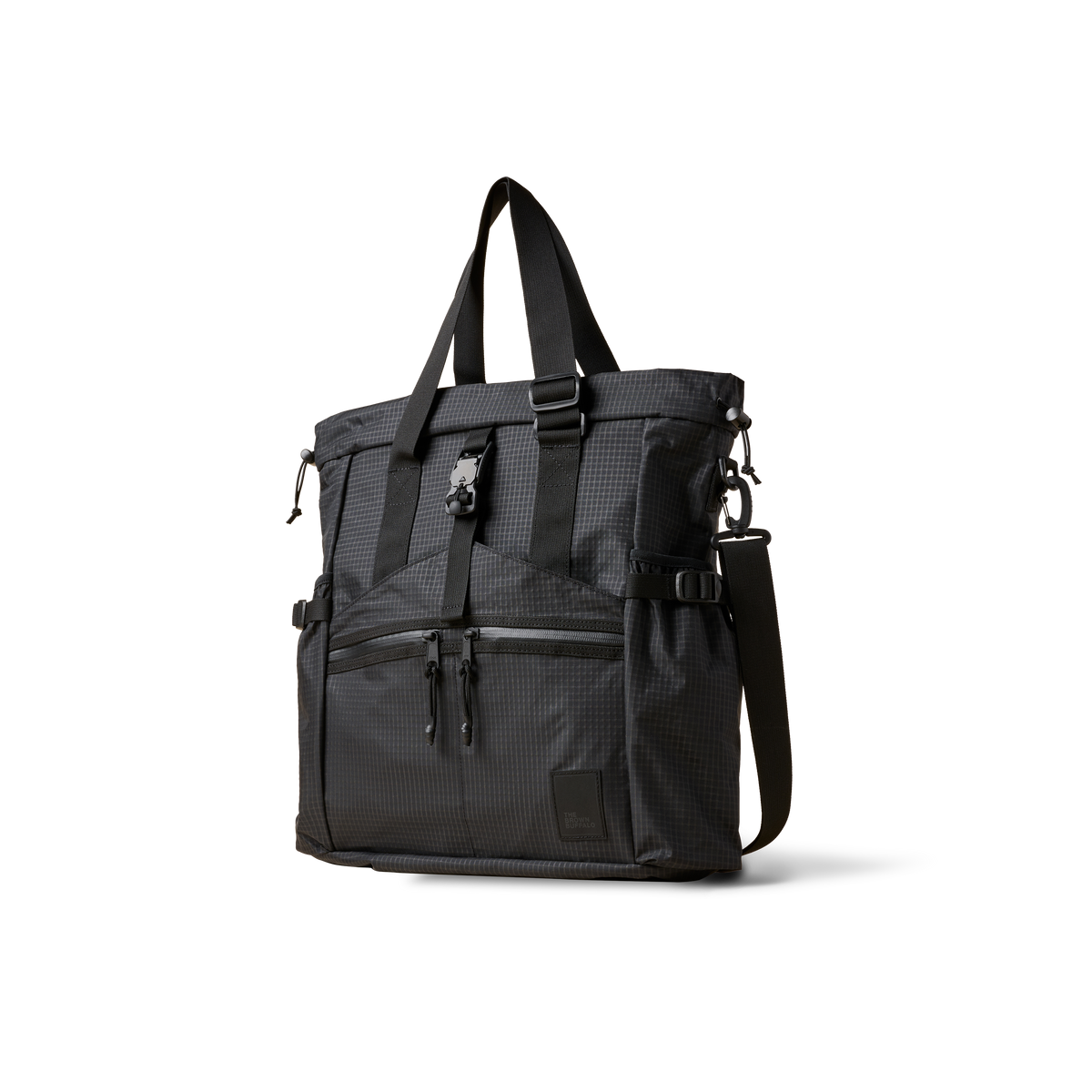 The Brown Buffalo Conceal Tote 20L laptop tote backpack in Black Grid