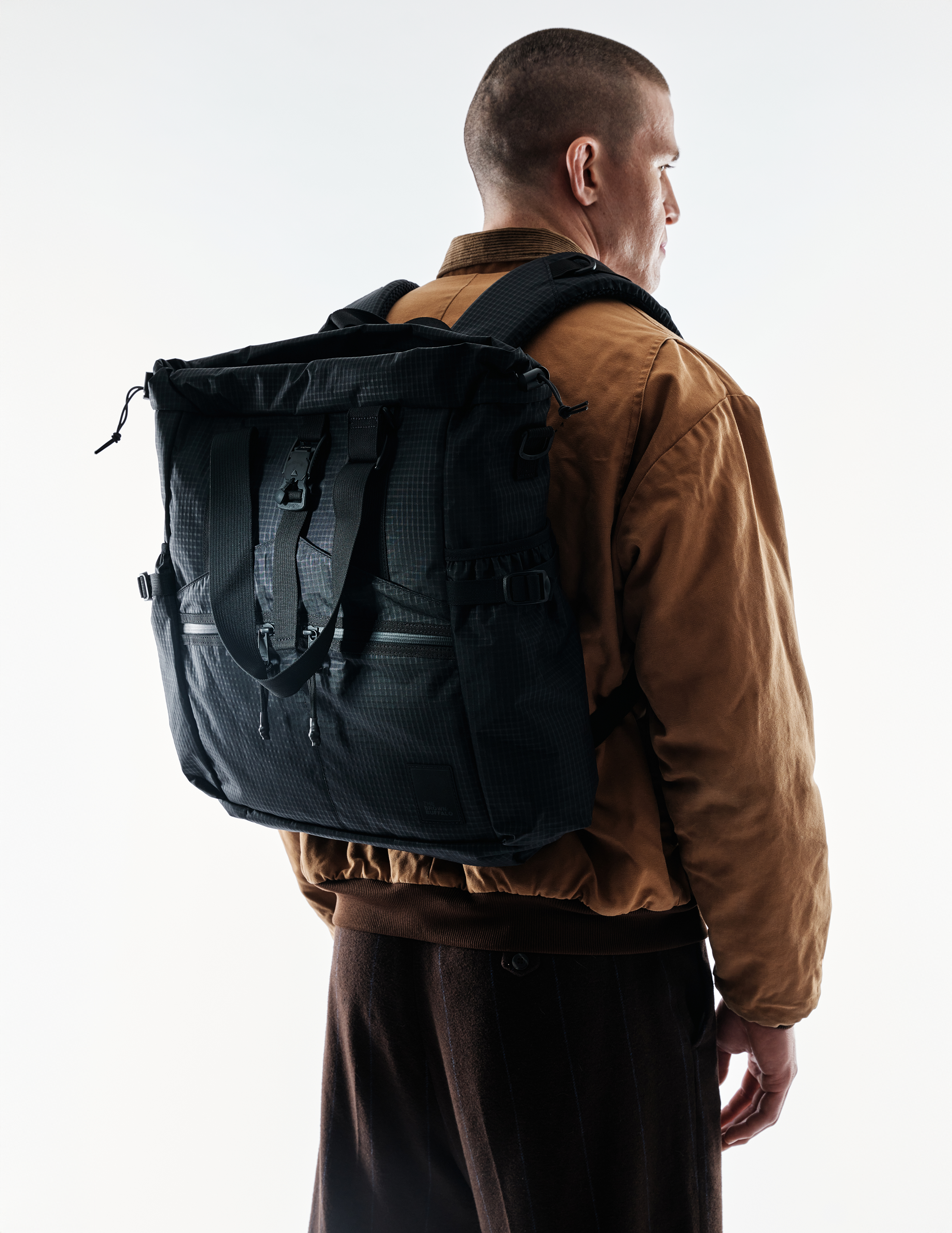 The Brown Buffalo Conceal Tote 20L laptop tote backpack in Black Grid, view 5