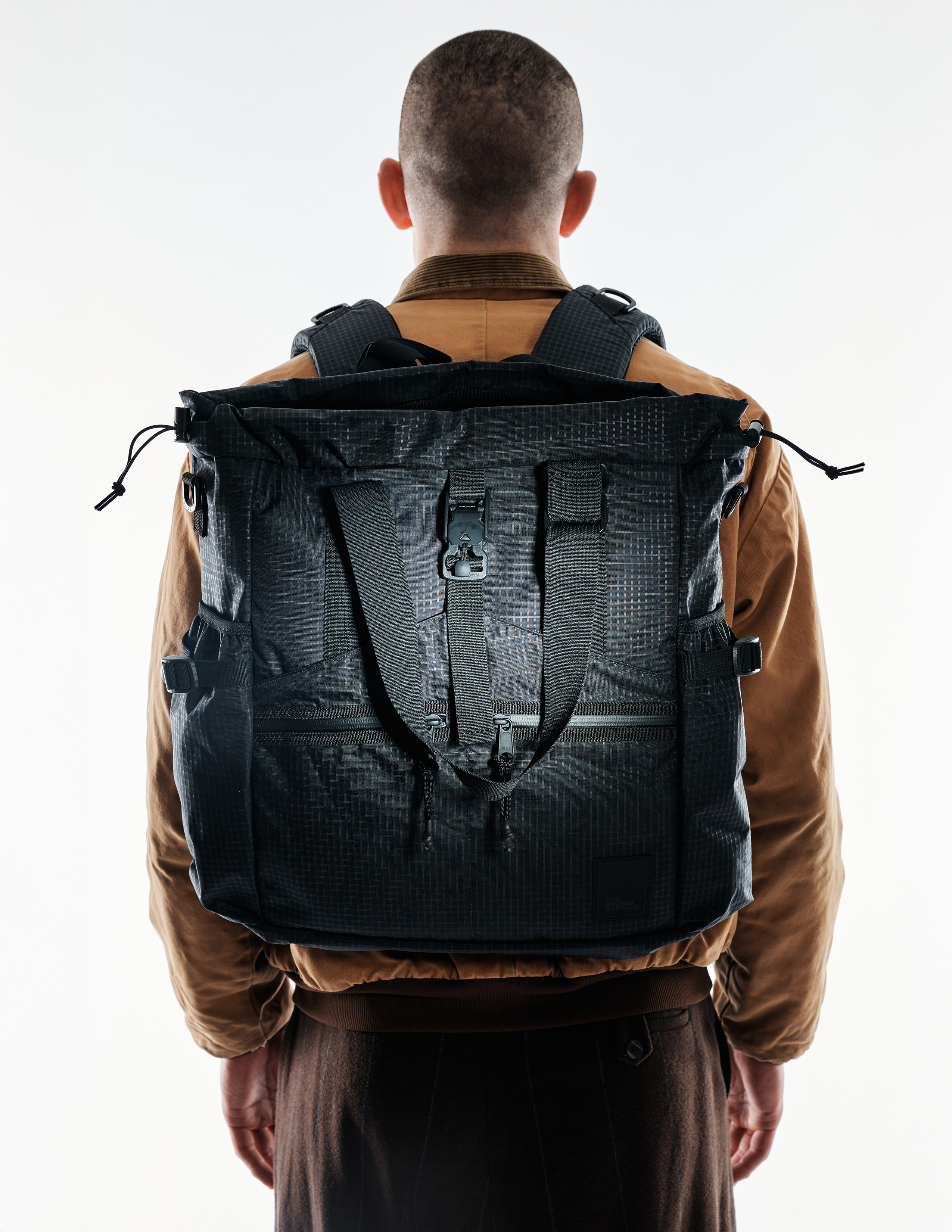 The Brown Buffalo Conceal Tote 20L laptop tote backpack in Black Grid, view 7