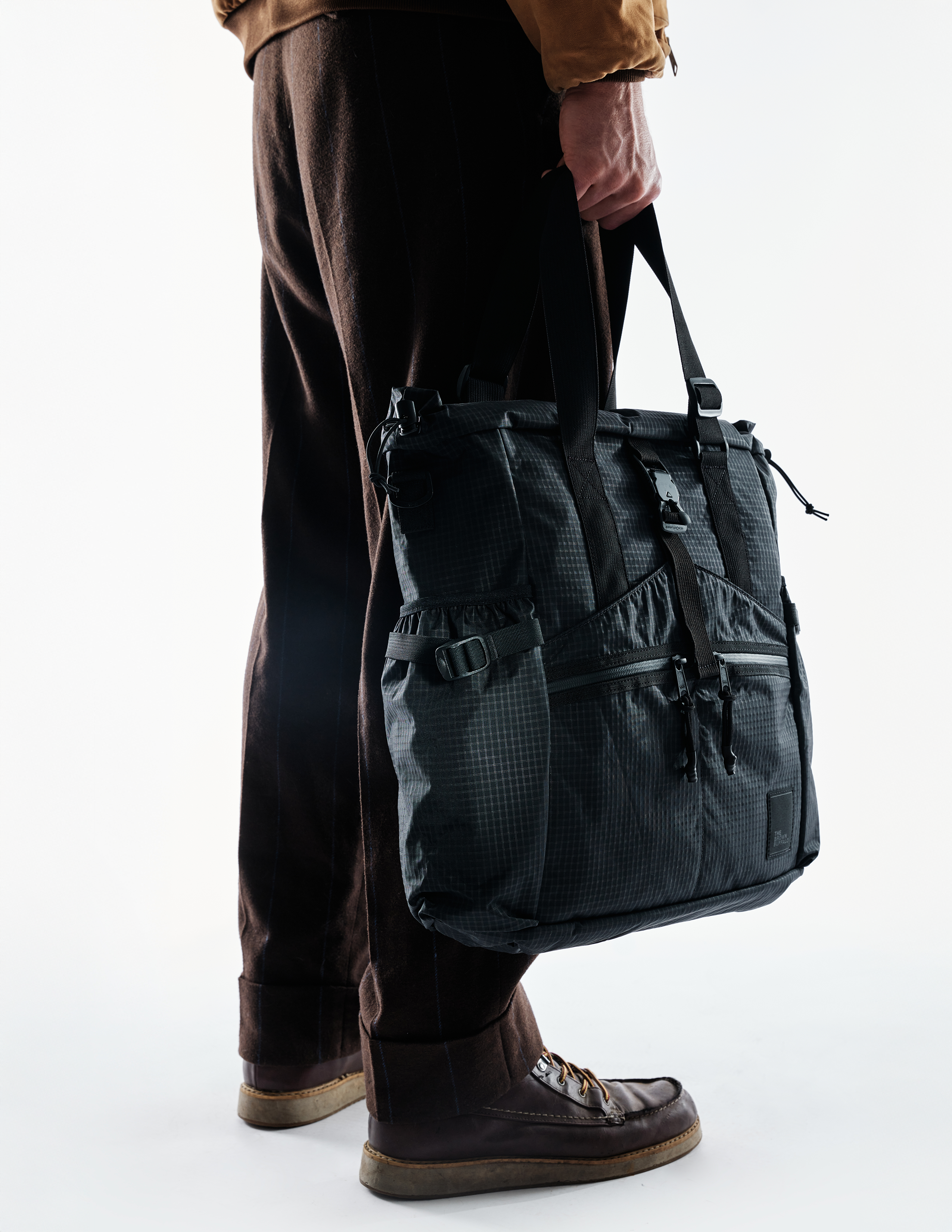 The Brown Buffalo Conceal Tote 20L laptop tote backpack in Black Grid, view 6