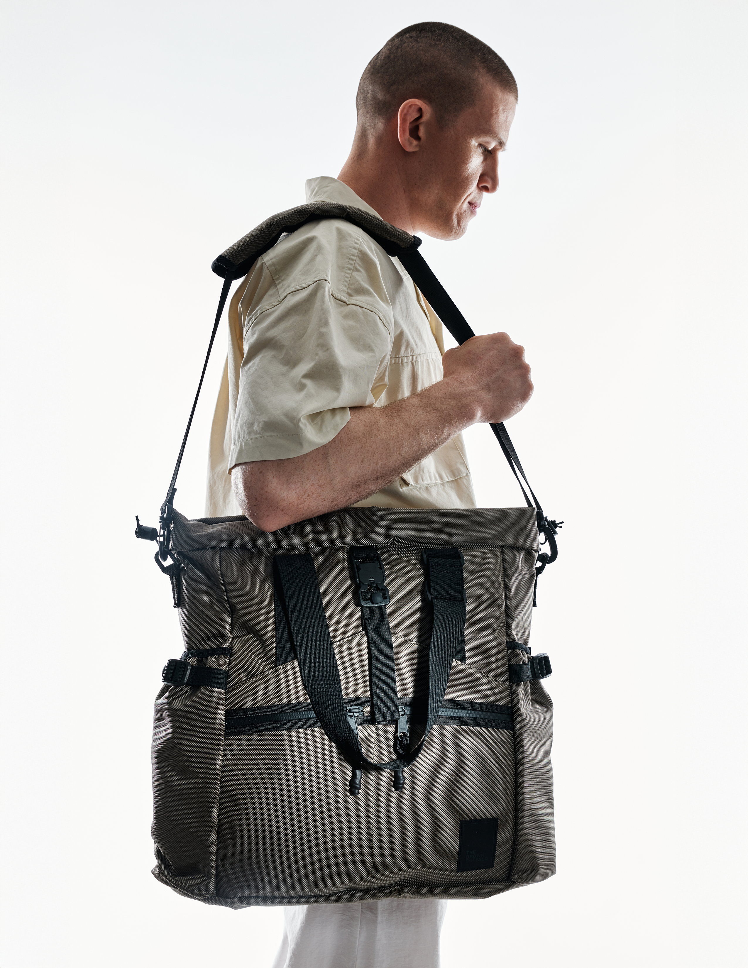 The Brown Buffalo Conceal Tote 20L laptop tote backpack in Ranger Green Ballistic, view 4