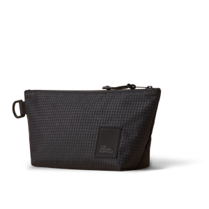 The Brown Buffalo Dopp Kit toiletry bag in Black Grid