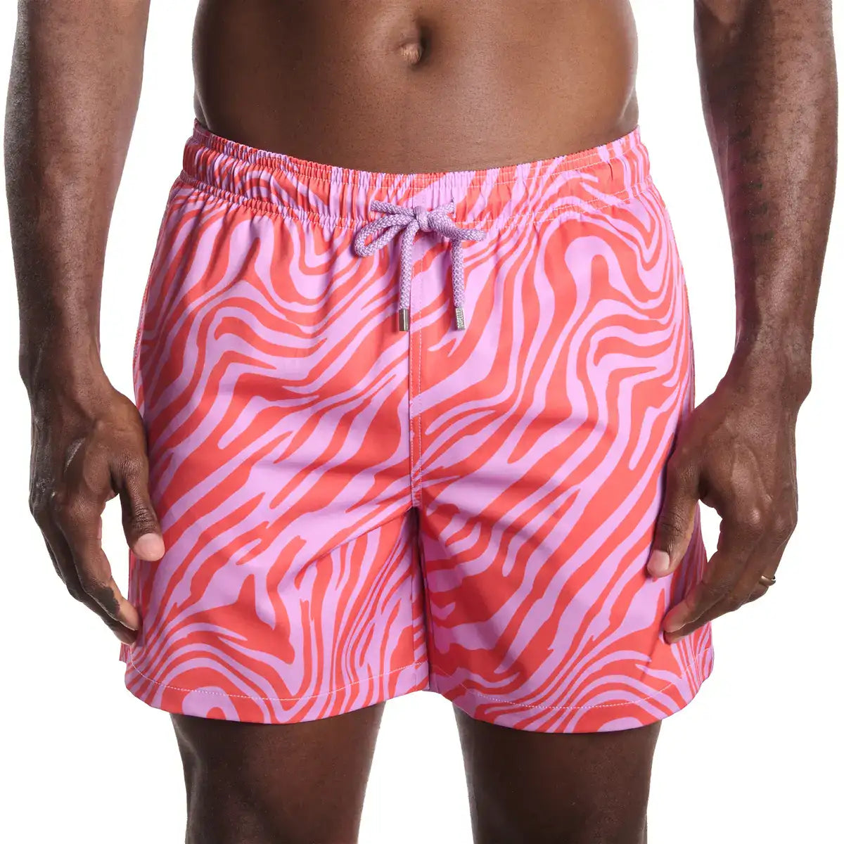 Tropical Swirl, Coral and Orchid men's hybrid swim short in a coral and pink swirled print, front view, second angle