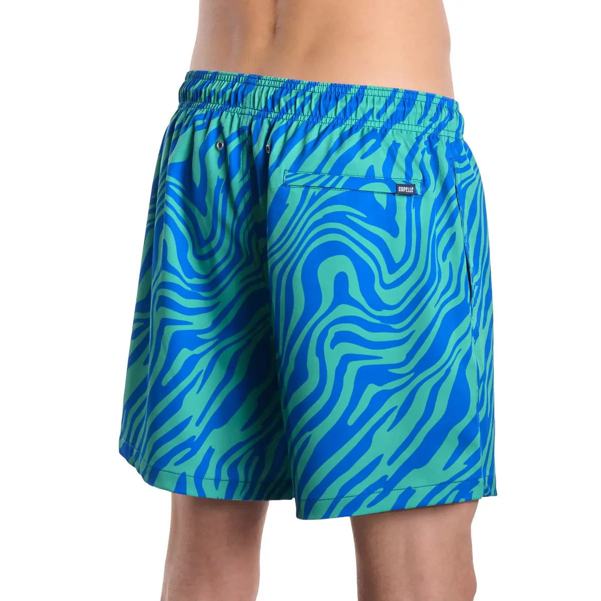 Tropical Swirl, Ocean and Palm men's hybrid swim short in a blue and green swirled print, back view