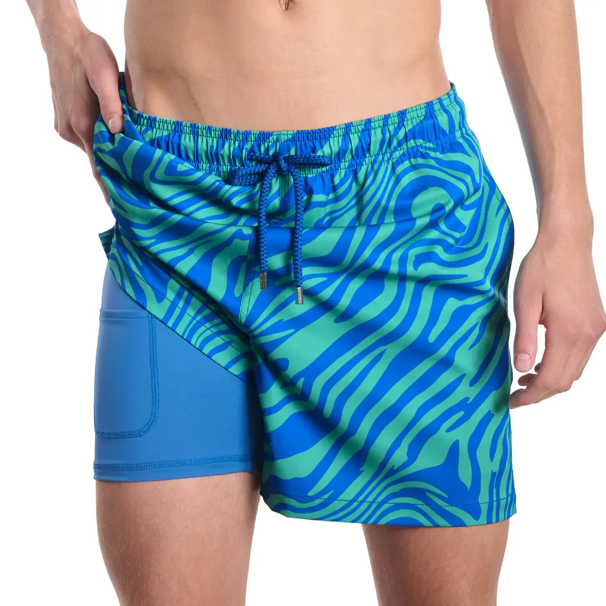 Tropical Swirl, Ocean and Palm men's hybrid swim short, blue and green swirled zebra print, front view showing the blue compression liner
