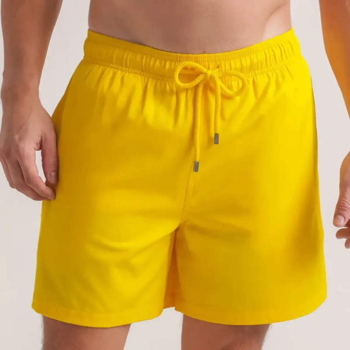 True Yellow men's hybrid swim short in solid bright yellow, front view, second angle