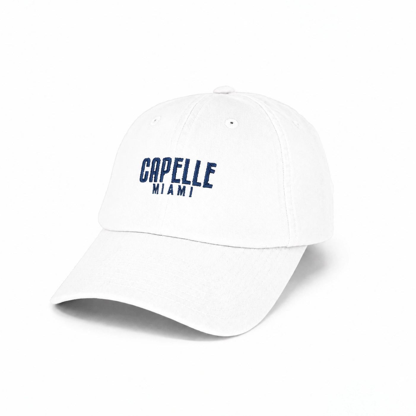 Arctic White Crew Unstructured Cotton Dad Hat, front, washed twill with flat satin embroidered Capelle Miami logo in arctic blue
